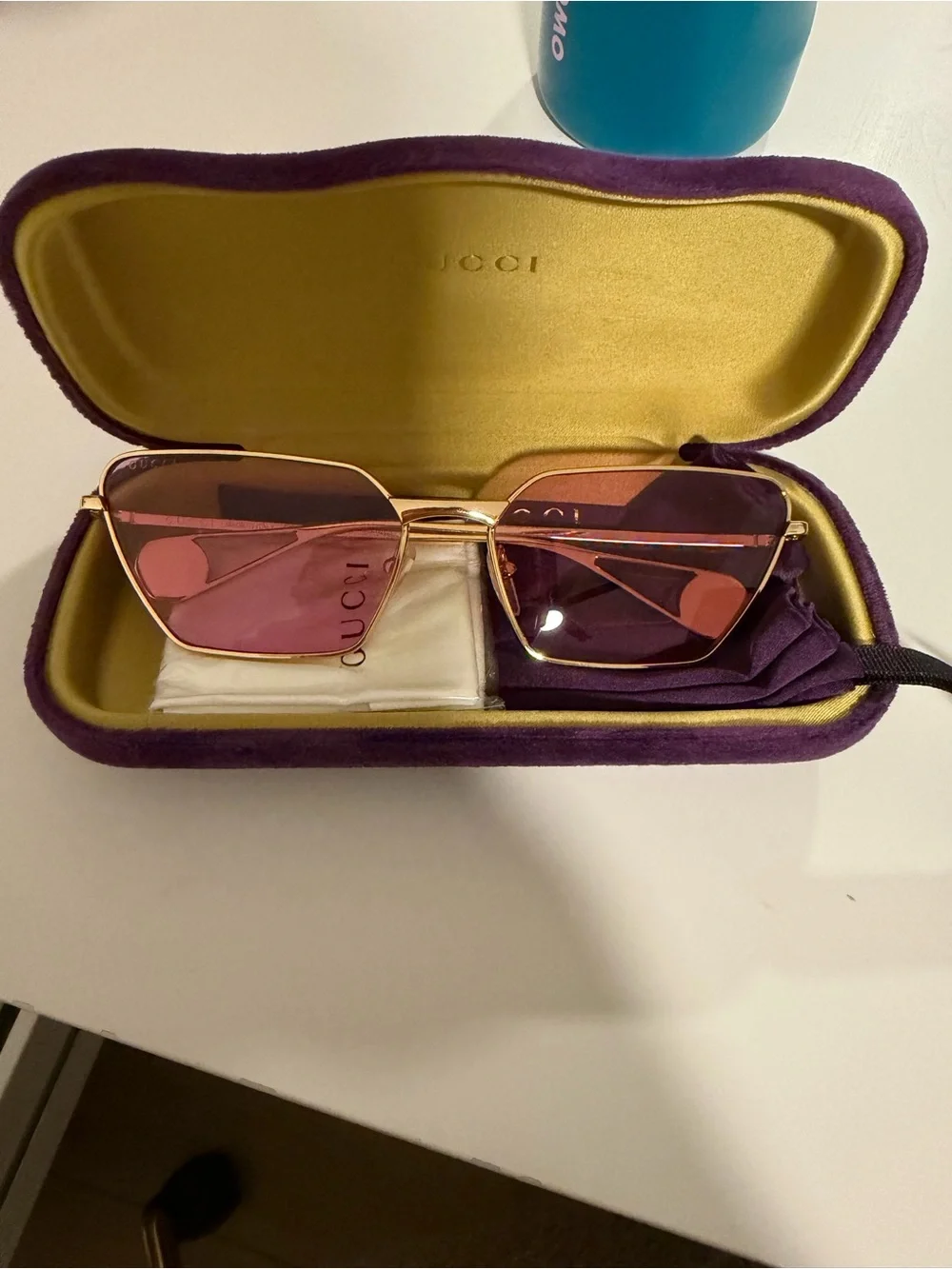 Gucci Gold Frame Sunglasses with Pink Lenses